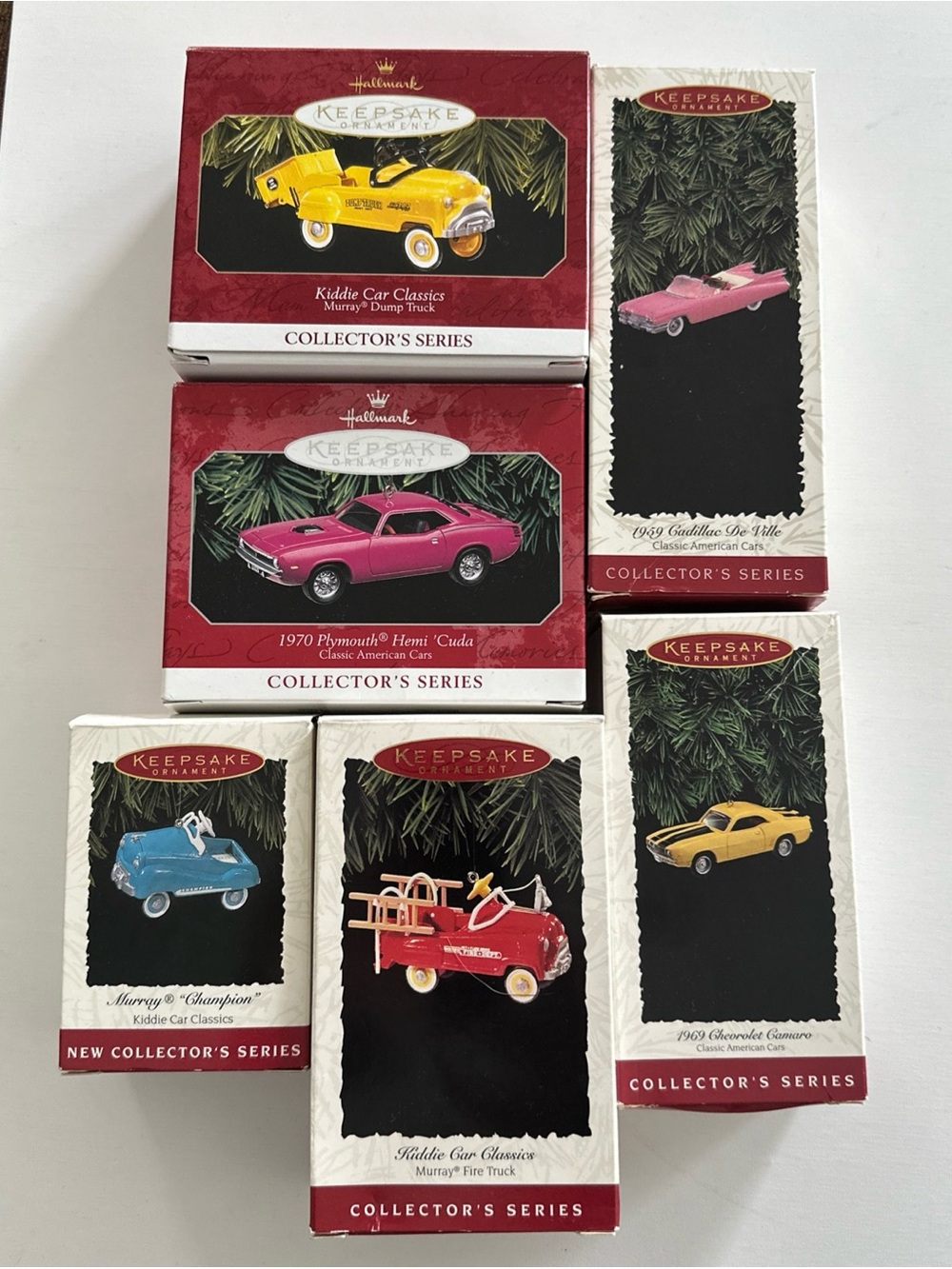 Hallmark Keepsake Ornament Collector's Series Car Pink, Yellow, Blue, Red.